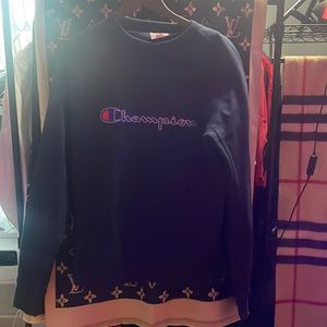 This is a dark blue champion long sleeve